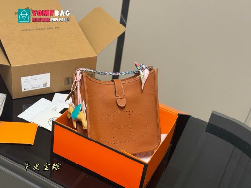 Túi xách cầm tay Hesmes evelyne màu nâu da bò cao cấp size 19 cm và 24 cm