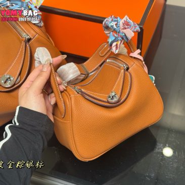 Túi xách cầm tay Hesmes lindy màu nâu da bò cao cấp size 19 cm và 23 cm